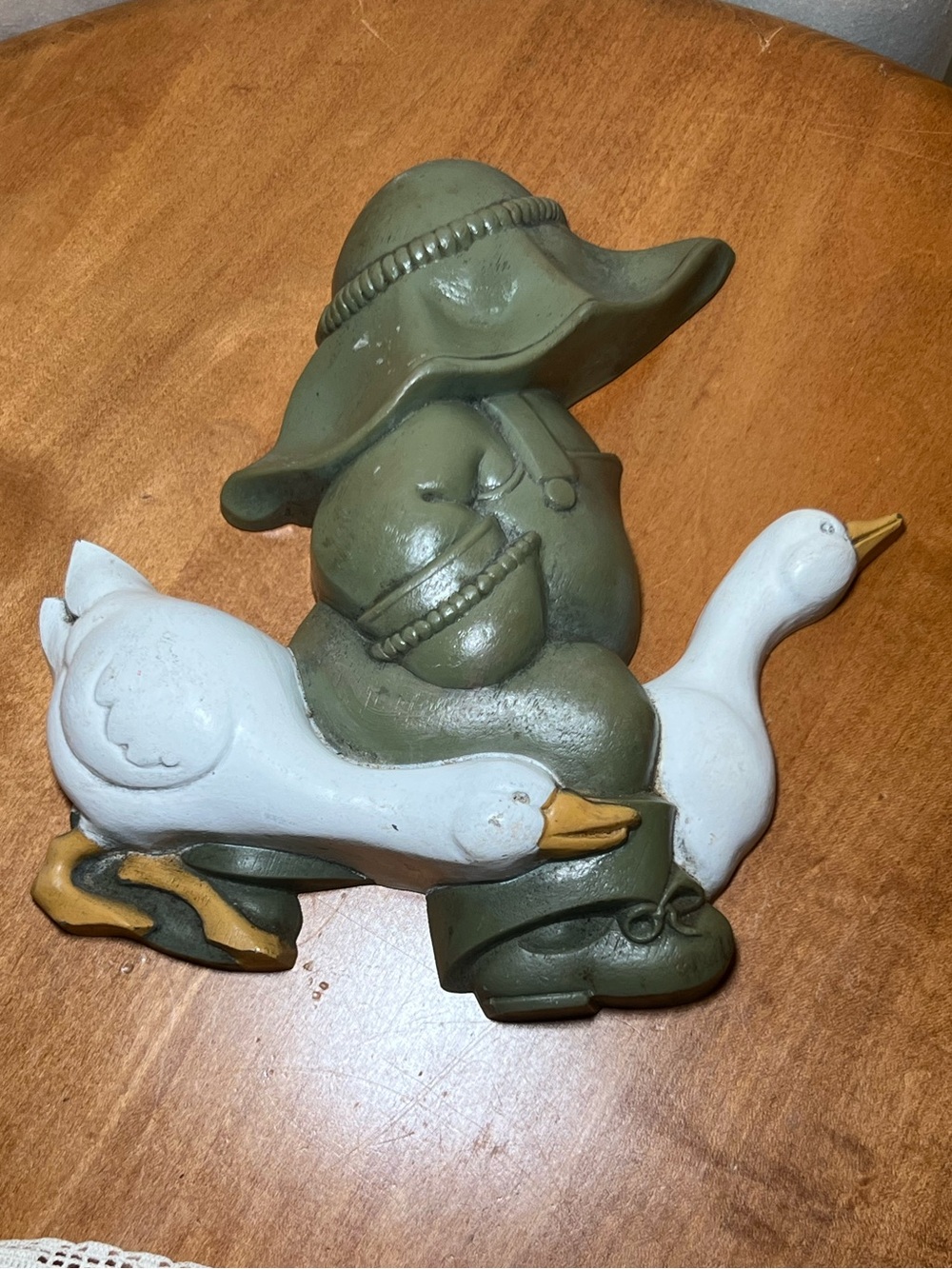 A vintage Homco/Burwood Products molded wall plaque of a child walking 2 goose
